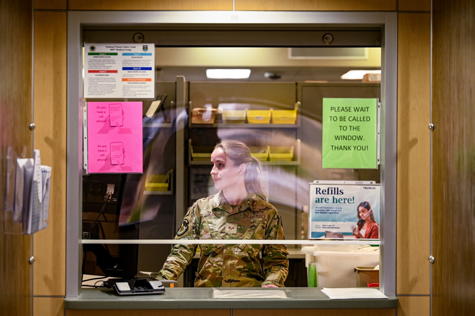 woman fills pharmacy prescriptions