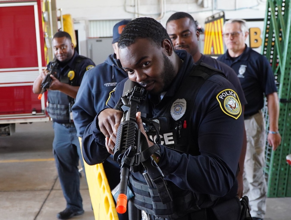 YORKTOWN, Va. (September 23, 2024) Civilian Police Officers assigned to the Security Department onboard Naval Weapons Station Yorktown along with personnel assigned to the installation’s Fire & Emergency Medical Services Department conduct casualty extraction training. The training was conducted at Fire Station 13 onboard Naval Weapons Station Yorktown, and ensures seamless interoperability and the ability to react and respond to emergent incidents onboard the installation. (U.S. Navy Photo by Max Lonzanida/Released).