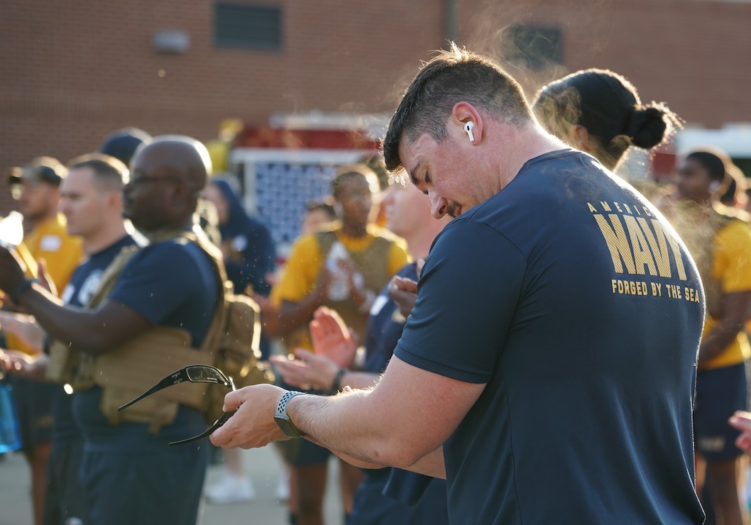 WILLIAMSBURG, Va. (September 11, 2024) Senior Chief Master-at-Arms Ethan Holland, assigned to the Security Department onboard Naval Weapons Station Yorktown, is pictured at the finish line after participating in the first annual 9/11 Stair Climb event onboard Cheatham Annex. The commemorative event honored the courageous first responders and others who lost their lives during the tragic events of September 11, 2001. The event featured two distinct groups of walkers and runners. Over 250 participants from multiple commands in area participated, and navigated through 10 designated stations representing every 11th floor that the first responders ascended during their heroic efforts. Additionally, participants donned name tags printed with the names of first responders who perished during that fateful day. (U.S. Navy Photo by Max Lonzanida/Released).