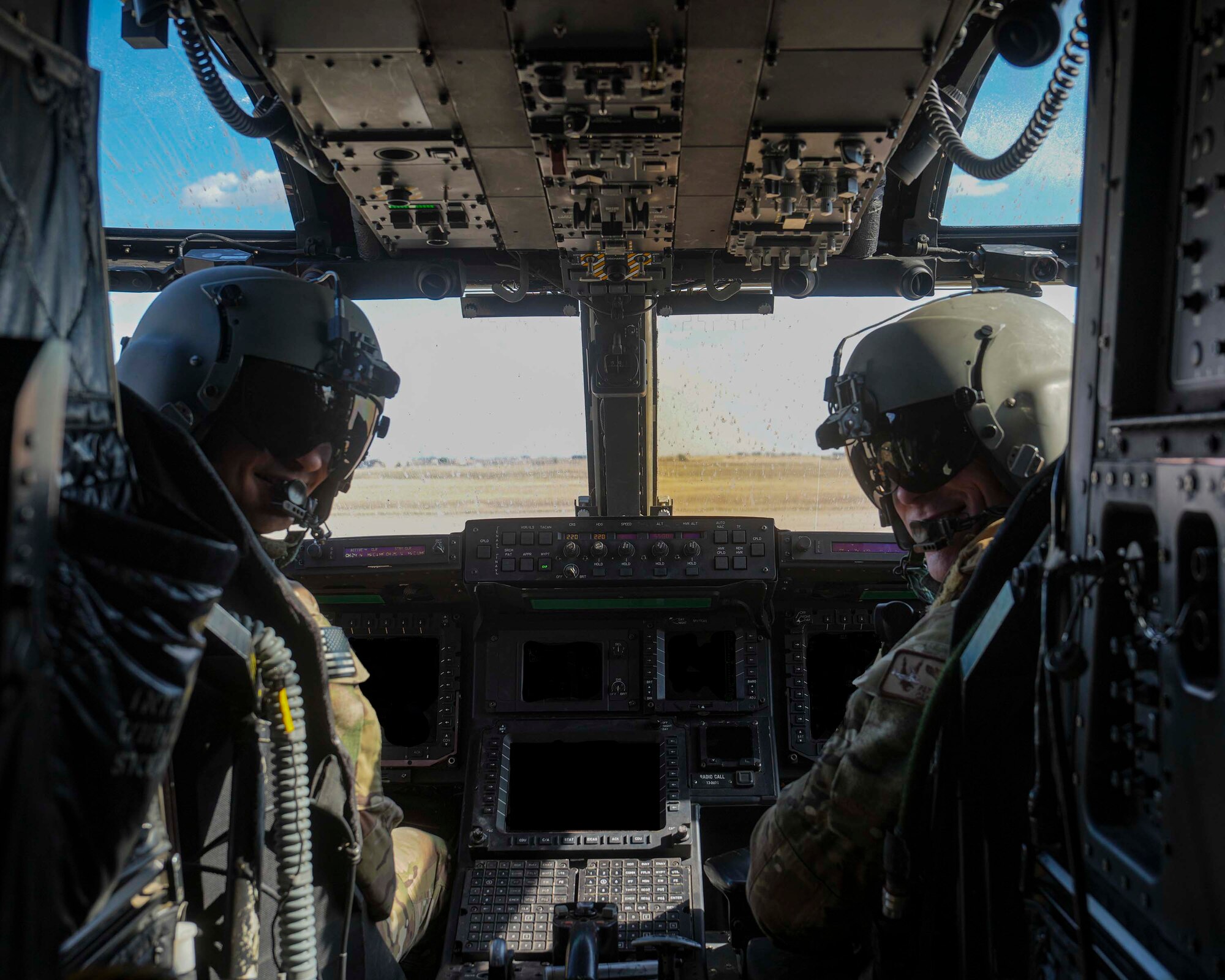 U.S. Air Force Maj. Lucas Duncavage (left) and U.S. Air Force Capt. Patrick Lavelle (right), 20th Special Operations Squadron CV-22 Osprey pilots, finish powering down the aircraft after a training exercise at Cannon Air Force Base, New Mexico, Oct. 9, 2024. The CV-22 Osprey allows Air Commandos to clandestinely insert, extract and re-supply unconventional warfare forces in hostile territory using airland or airdrop procedures. (U.S. Air Force photo by Airman 1st Class Gracelyn Hess)