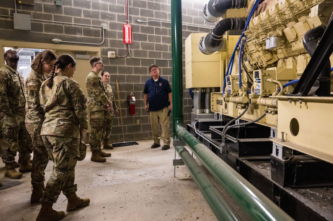 Members of the 316th CES inspect a generator during a facility exchange at Nationals Park.
