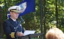 YORKTOWN, Va. (October 18, 2024) Captain Dan Patrick, Commanding Officer, Naval Weapons Station Yorktown delivers remarks during a wreath laying ceremony at the American Revolution Museum at Yorktown. The wreath laying event was coordinated by the USS Yorktown (CG-48) reunion association, and was held in honor of the ship’s sponsor, Mary Matthews. USS Yorktown (CG-48) was a Ticonderoga-class guided missile cruiser that was commissioned in 1984 at Naval Weapons Station Yorktown and decommissioned in 2004.  (U.S. Navy Photo by Max Lonzanida/Released).