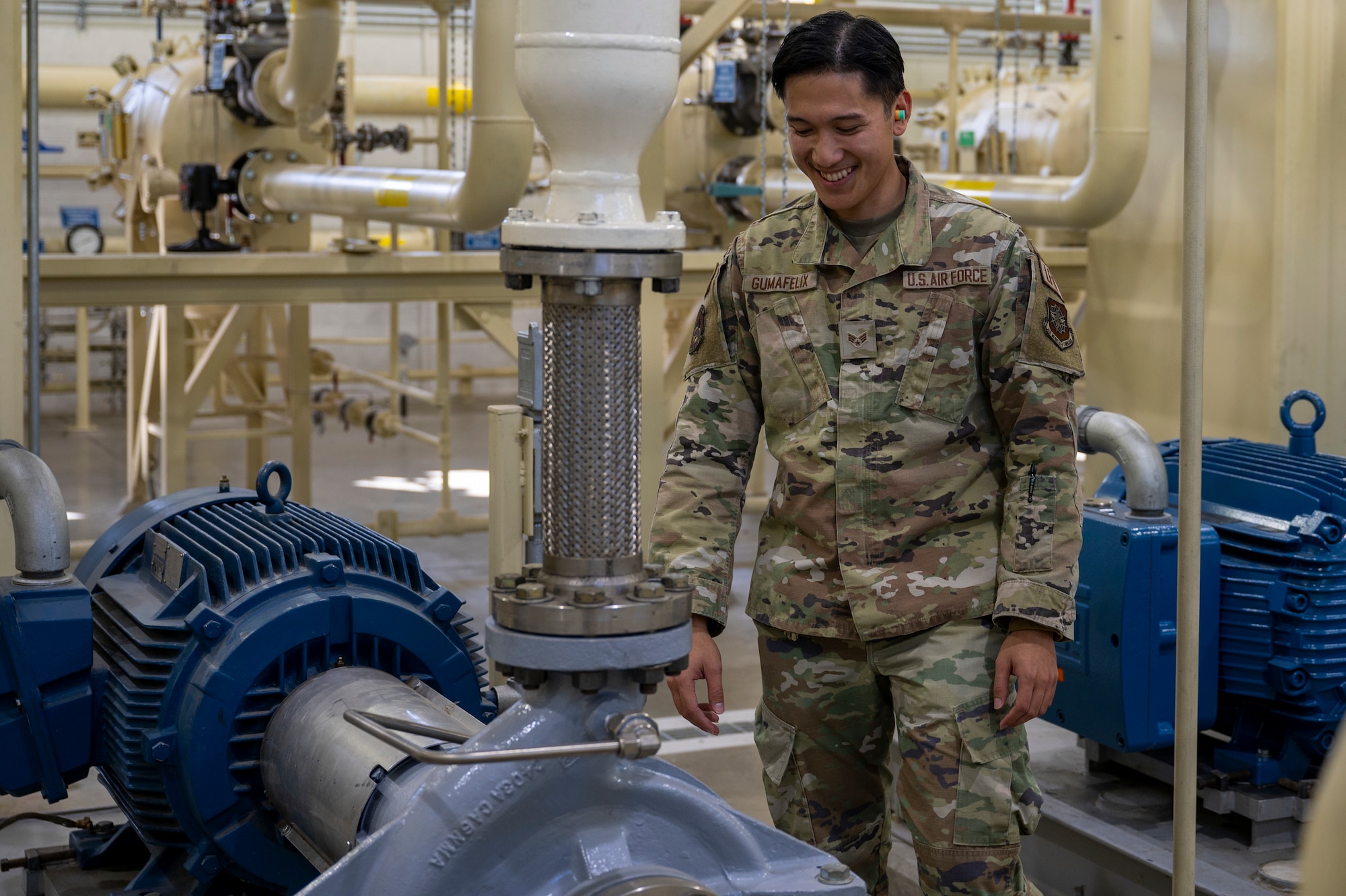 U.S. Air Force Senior Airman Aaron Vincent Gumafelix, a fuels systems maintenance specialist assigned to the 92nd Civil Engineering Squadron, inspects the oil levels of the pump at Fairchild Air Force Base, Washington, Oct. 1, 2024. The output provided by these pumps play a critical role in ensuring aircraft receive the proper fuel needed to operate efficiently. (U.S. Air Force photo by Airman 1st Class Samantha Thorn)