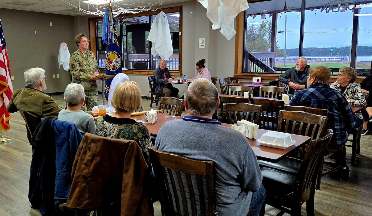 Arnold Engineering Development Complex Senior Enlisted Leader Chief Master Sgt. Jennifer Cirricione speaks during the monthly meeting of the Franklin County Disabled American Veterans, Chapter 71, Oct. 15, 2024, at the Veterans of Foreign Wars Post in Estill Springs, Tenn. Cirricione provided information on the history of AEDC and fielded questions regarding base access, future space utilization and base tour availability for retirees. AEDC personnel were also on hand to discuss the services AEDC provides to retirees and their families once a retiree passes away, funeral honors for retirees, legal assistance and other information related to retiree benefits. AEDC is headquartered at Arnold Air Force Base, Tenn. (Courtesy photos by Kim Heng)