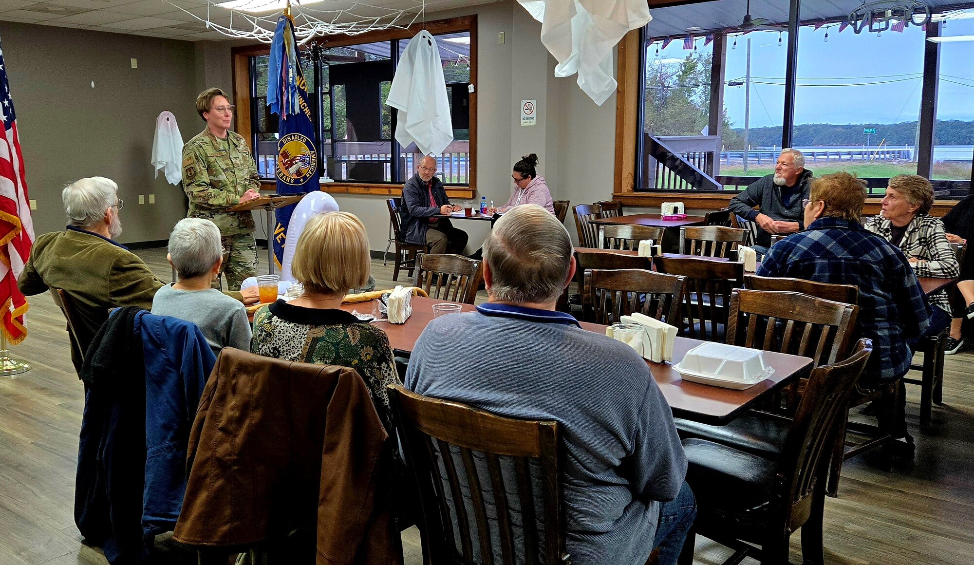Arnold Engineering Development Complex Senior Enlisted Leader Chief Master Sgt. Jennifer Cirricione speaks during the monthly meeting of the Franklin County Disabled American Veterans, Chapter 71, Oct. 15, 2024, at the Veterans of Foreign Wars Post in Estill Springs, Tenn. Cirricione provided information on the history of AEDC and fielded questions regarding base access, future space utilization and base tour availability for retirees. AEDC personnel were also on hand to discuss the services AEDC provides to retirees and their families once a retiree passes away, funeral honors for retirees, legal assistance and other information related to retiree benefits. AEDC is headquartered at Arnold Air Force Base, Tenn. (Courtesy photos by Kim Heng)