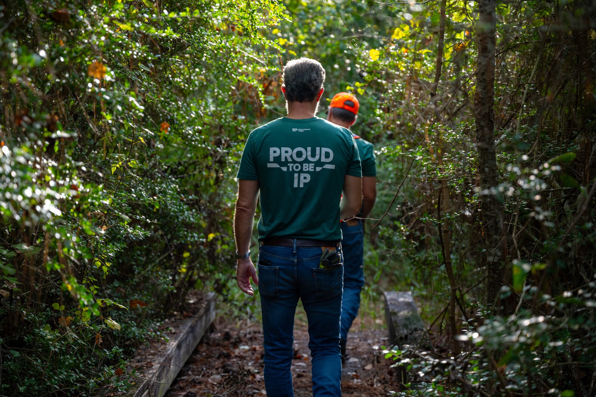 A volunteer from International Paper walks along Grace Brown Nature Trail at Hurlburt Field, Florida, Oct. 3, 2024.