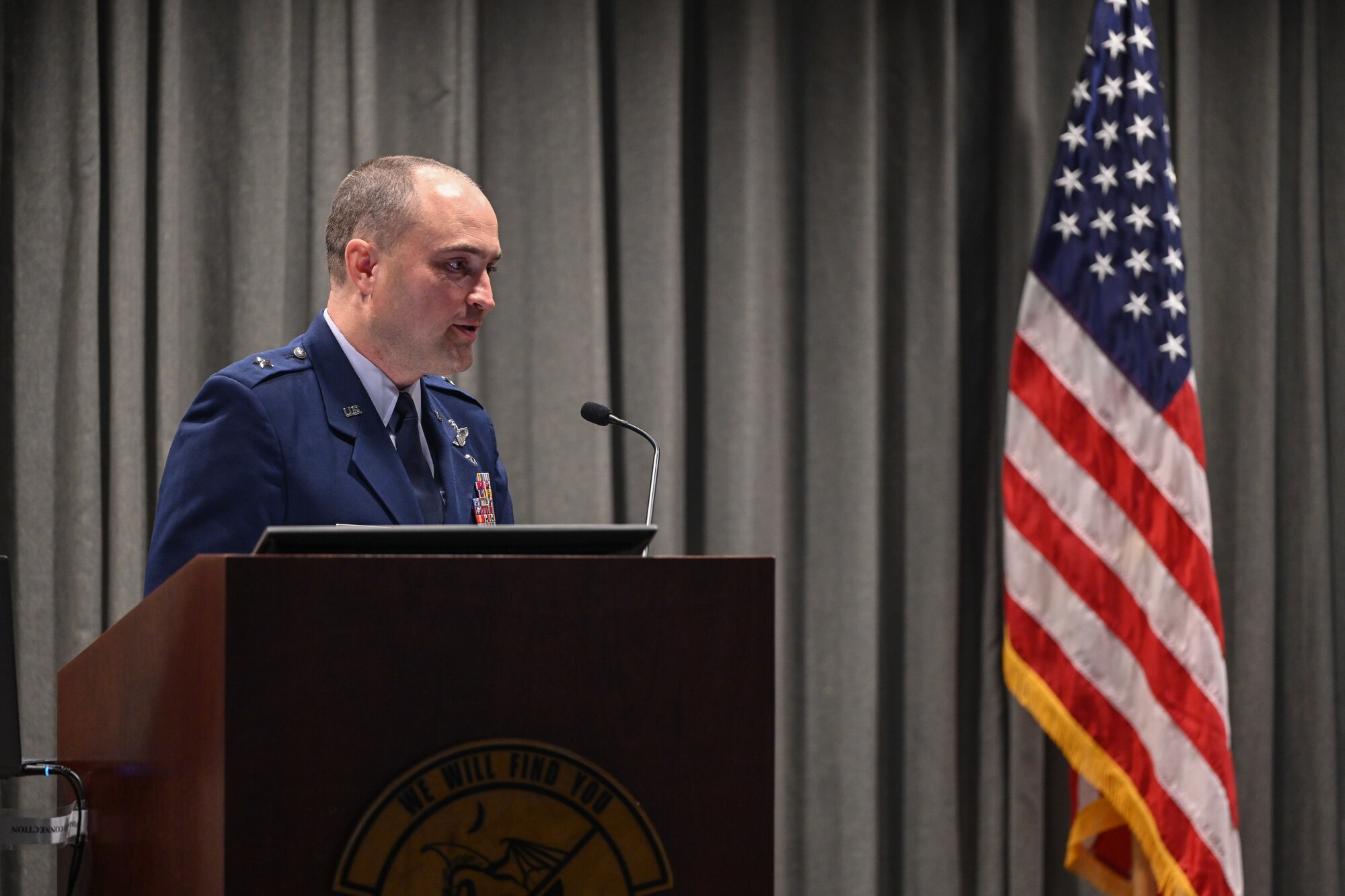 U.S. Air Force Brig. Gen. Lawrence Sullivan, 57th Wing commander, gives a speech at a Distinguished Flying Cross Ceremony at Hurlburt Field, Florida, Oct. 8, 2024. Hurlburt Field, Florida, Oct. 8, 2024.