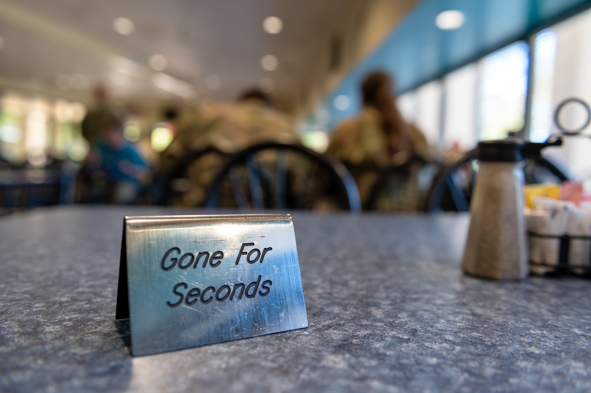A “Gone for Seconds” sign is displayed on a table at the Riptide Dining Facility on Hurlburt Field, Florida, Oct. 17, 2024.