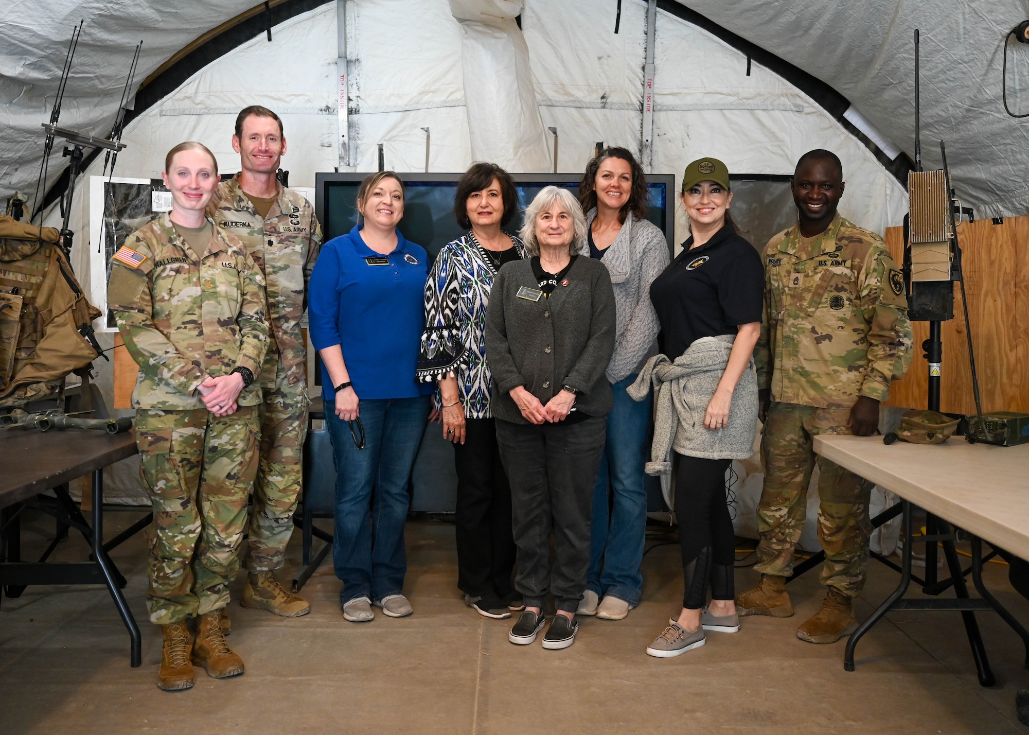 Members of the 344th Military Intelligence Battalion and 17th Training Wing Honorary Commanders pose for a photo at Goodfellow Air Force Base, Texas, Oct. 18, 2024. The honorary commanders saw how the 17th TRW partners with all branches hosted at Goodfellow to stay at the forefront of military capability. (U.S. Air Force photo by Senior Airman Zach Heimbuch)