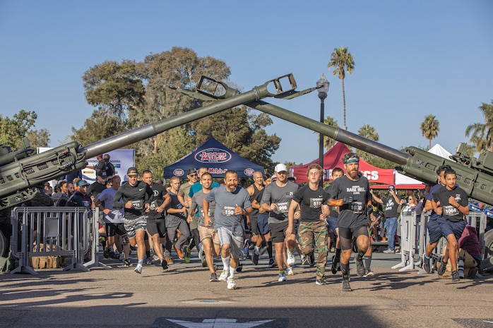Participants of the 2024 Marine Corps Recruit Depot San Diego Boot Camp Challenge cross the starting line at  at MCRD San Diego, California, Oct. 19, 2024. For the past 23 years, MCRD San Diego has hosted the MCRD San Diego Boot Camp Challenge, a three-mile obstacle course race guided by 60 drill instructors that highlights the physical and mental demands of boot camp. The event fosters comradery and community engagement through interaction with MCRD personnel. (U.S. Marine Corps photo by Cpl. Alexandra M. Earl)