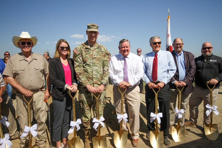 Project partners with the U.S. Army Corps of Engineers Los Angeles District, Riverside County Flood Control and Water Conservation District, City of Norco, California Office of Emergency Services, Riverside County, along with U.S. Rep. Ken Calvert of California’s 41st Congressional District and contractors, stand together Oct. 3 for a photo along the Santa Ana River in Norco, California, at the Upper Norco Bluffs Emergency Repair Project groundbreaking ceremony.