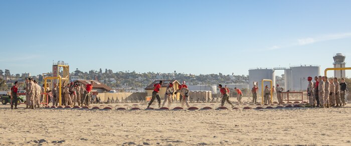 U.S. Marine Corps recruits with Alpha Company, 1st Recruit Training Battalion, participate in a body sparring event at Marine Corps Recruit Depot San Diego, California, Oct. 21, 2024. Recruits are taught Marine Corps Martial Arts Program techniques, which instill basic self-defense that they will execute throughout recruit training during events like body sparring and pugil sticks to help build a warrior ethos and esprit de corps. (U.S. Marine Corps photo by Lance Cpl. Janell B. Alvarez)