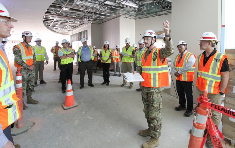 Capt. Gregory Sacenti, project engineer with the U.S. Army Corps of Engineers Los Angeles District, third from right, leads a tour Oct. 9 for senior leaders with Headquarters USACE and the Department of Veterans Affairs of the Spinal Cord Injury/Community Living Center at the Jennifer Moreno DVA Medical Center campus in San Diego. Visiting leaders included Brig. Gen. Kirk Gibbs, deputy commanding general for USACE’s Military and International Operations, and Michael Parrish, chief acquisition officer and principal executive director for DVA’s Office of Acquisition, Logistics and Construction.