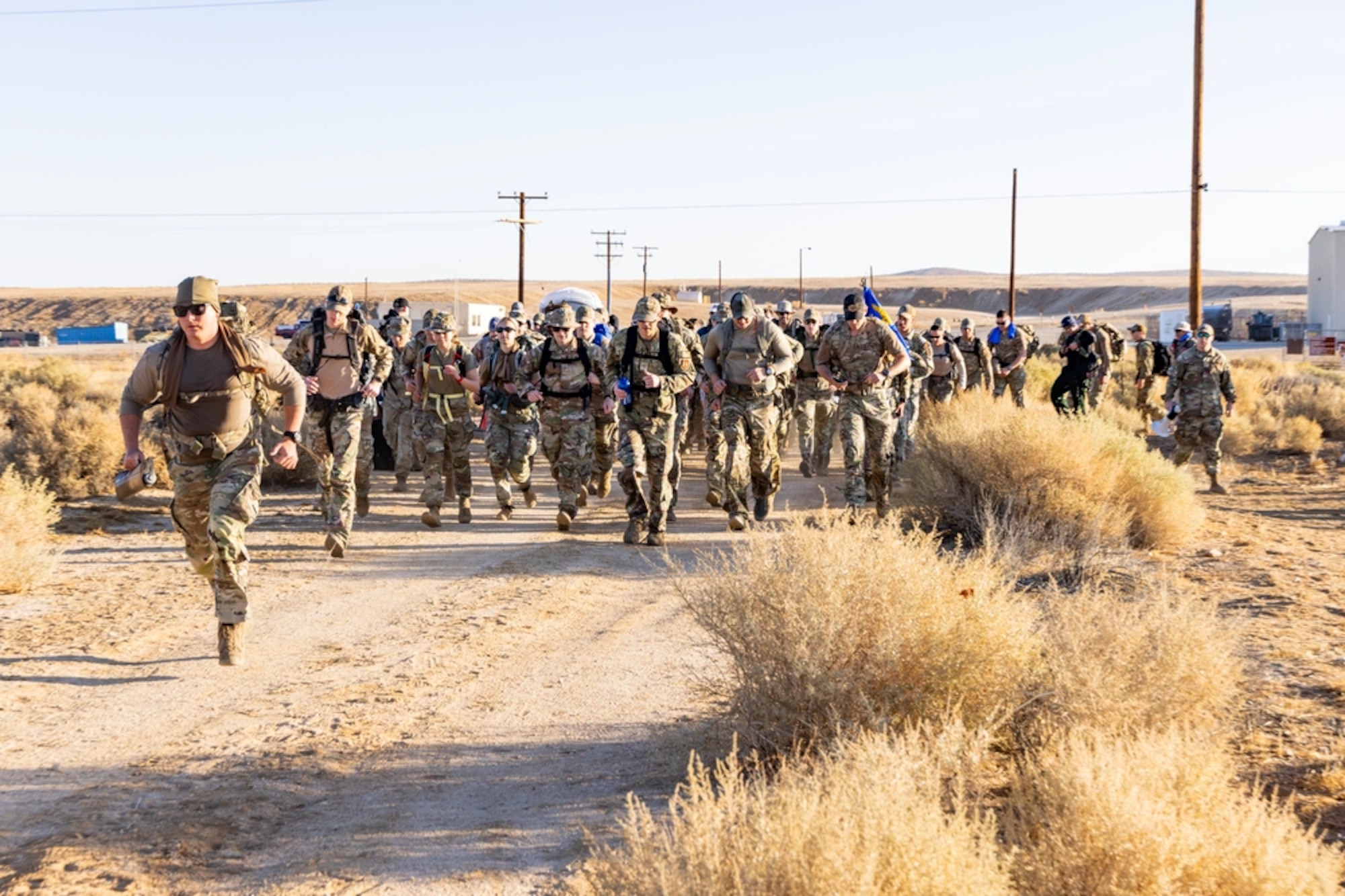 Airmen, Sailors, Soldiers, Marines and Guardians from throughout Southern California participated in the Norwegian Foot March at Edwards Air Force Base, California, Oct. 15. (Air Force photo by Madeline Guadarrama)
