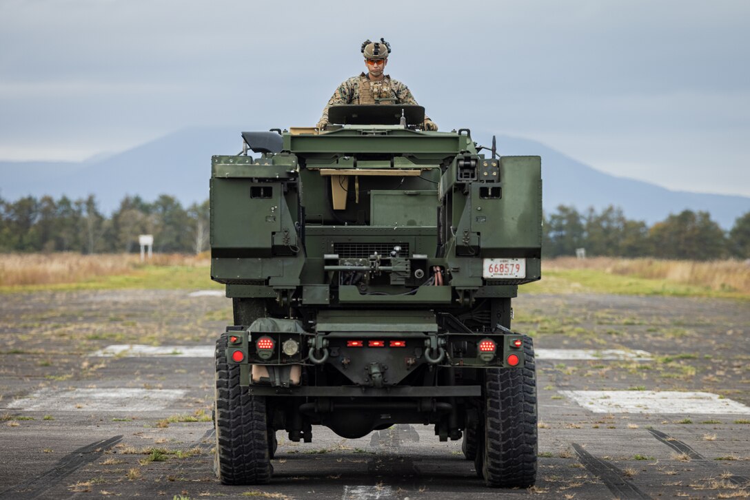 U.S. Marine Corps Sgt. Alejandro Quintero Jr., a High Mobility Artillery Rocket System operator with 3d Battalion, 12th Marine Littoral Regiment, 3d Marine Division, operates an M142 HIMARS in preparation for Keen Sword 25 at Japan Air Self –Defense Force Kenebetsu Air Base, Hokkaido, Japan, Oct. 18, 2024. KS25 is a biennial, joint and bilateral field-training exercise involving U.S. military and Japan Self-Defense Force personnel, designed to increase readiness and interoperability while strengthening the ironclad U.S.-Japan alliance. (U.S. Marine Corps photo by Lance Cpl. Rodney Frye)