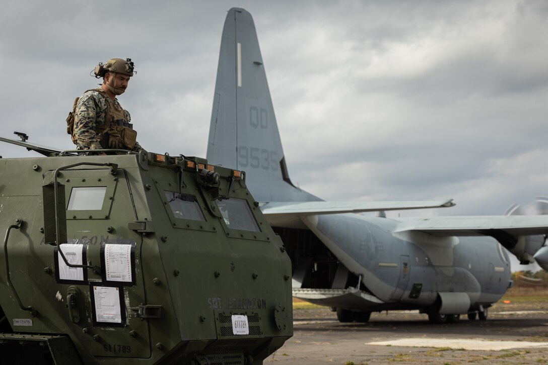 U.S. Marine Corps Sgt. Reyn Kahalewai, a High Mobility Artillery Rocket System operator with 3d Battalion, 12th Marine Littoral Regiment, 3d Marine Division, provides visual oversight of an M142 HIMARS movement in preparation for Keen Sword 25 at Japan Air Self –Defense Force Kenebetsu Air Base, Hokkaido, Japan, Oct. 18, 2024. KS25 is a biennial, joint and bilateral field-training exercise involving U.S. military and Japan Self-Defense Force personnel, designed to increase readiness and interoperability while strengthening the ironclad U.S.-Japan alliance. Kahalewai is a native of Hawaii. (U.S. Marine Corps photo by Lance Cpl. Rodney Frye)