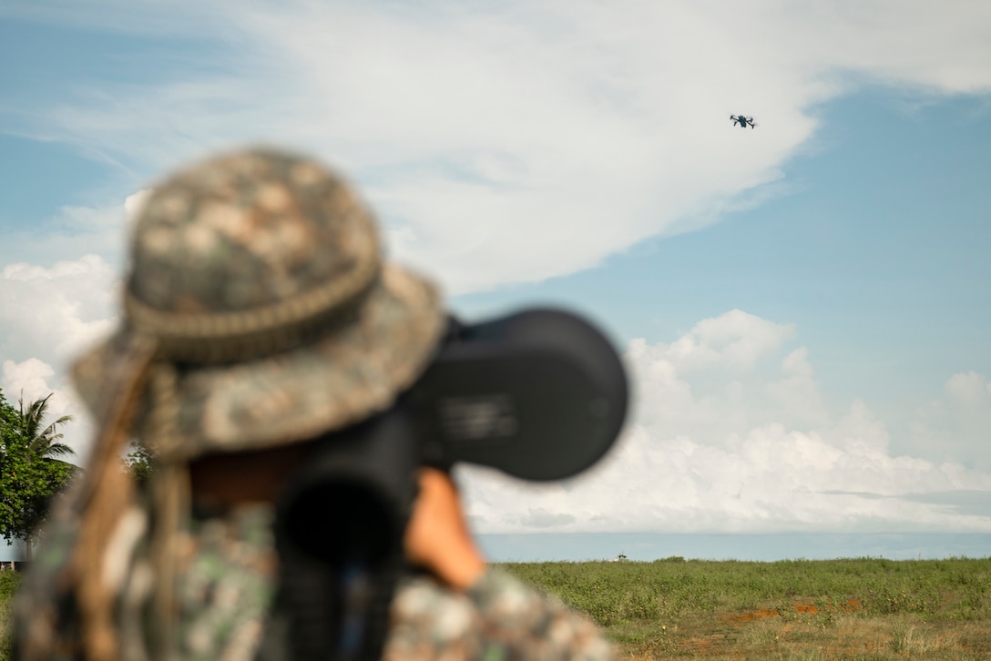 A Philippine Marine assigned to Intelligence Company, 3rd Marine Brigade, engages a small unmanned aircraft system with a NightFighter S counter-unmanned aerial vehicle system during a subject matter expert exchange with U.S. Marines assigned to the 15th Marine Expeditionary Unit as part of exercise KAMANDAG 8 at Tarumpitao Point, Palawan Province, Philippines, Oct. 18, 2024. KAMANDAG is an annual Philippine Marine Corps and U.S. Marine Corps-led exercise aimed at enhancing the Armed Forces of the Philippines’ defense and humanitarian capabilities by providing valuable training in combined operations with foreign militaries in the advancement of a Free and Open Indo-Pacific. This year marks the eighth iteration of this exercise and includes participants from the French Armed Forces, Royal Thai Marine Corps, and Indonesian Marine Corps; including continued participation from the Australian Defense Force, British Armed Forces, Japan Ground Self-Defense Force, and Republic of Korea Marine Corps. (U.S. Marine Corps photo by Sgt. Amelia Kang)