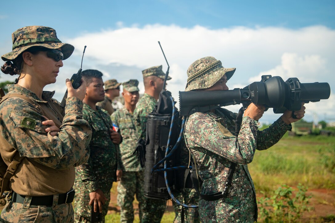 A Philippine Marine, right, assigned to Intelligence Company, 3rd Marine Brigade, engages a target with a NightFighter S counter-unmanned aerial vehicle system during a counter-unmanned aircraft system subject matter expert exchange with U.S. Marines assigned to the 15th Marine Expeditionary Unit as part of exercise KAMANDAG 8 at Tarumpitao Point, Palawan Province, Philippines, Oct. 18, 2024. KAMANDAG is an annual Philippine Marine Corps and U.S. Marine Corps-led exercise aimed at enhancing the Armed Forces of the Philippines’ defense and humanitarian capabilities by providing valuable training in combined operations with foreign militaries in the advancement of a Free and Open Indo-Pacific. This year marks the eighth iteration of this exercise and includes participants from the French Armed Forces, Royal Thai Marine Corps, and Indonesian Marine Corps; including continued participation from the Australian Defense Force, British Armed Forces, Japan Ground Self-Defense Force, and Republic of Korea Marine Corps. (U.S. Marine Corps photo by Sgt. Amelia Kang)