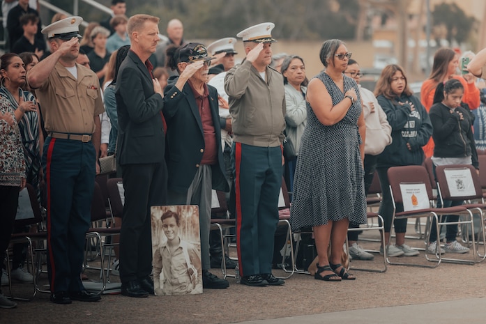 Retired U.S. Marine Corps Maj. Billy Hall, a veteran of World War II, the Korean War, and Vietnam War, salutes the colors during a colors ceremony at Marine Corps Recruit Depot San Diego, California, Oct. 11, 2024.The morning colors ceremony is conducted to formally raise our nation’s flag and provide a brief moment to reflect on its meaning. Hall visited MCRD San Diego to attend a graduation ceremony for Bravo Company, 1st Recruit Training Battalion. (U.S. Marine Corps photo by Cpl. Alexander O. Devereux)