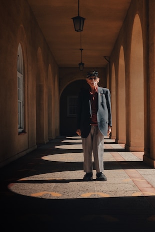 Retired U.S. Marine Corps Maj. Billy Hall, a veteran of World War II, the Korean War, and Vietnam War, stands on the Yellow Footprints at Marine Corps Recruit Depot San Diego, California, Oct. 11, 2024. Hall visited MCRD San Diego to attend a graduation ceremony for Bravo Company, 1st Recruit Training Battalion. The Yellow Footprints are iconic to the Depot as all recruits stand upon them to receive initial instruction during their immediate arrival for training to become Marines. (U.S. Marine Corps photo by Cpl. Alexander O. Devereux)