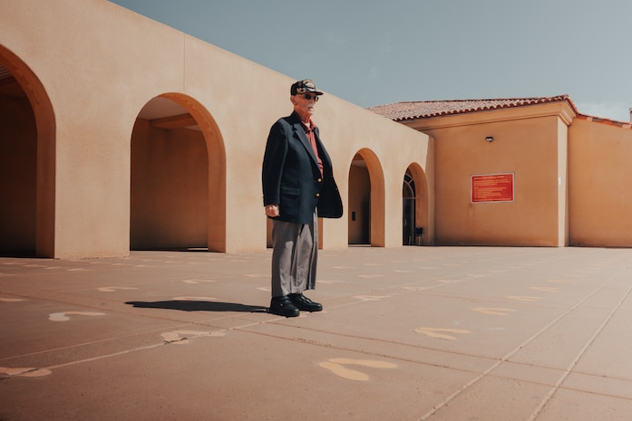 Retired U.S. Marine Corps Maj. Billy Hall, a veteran of World War II, the Korean War, and Vietnam War, stands on the Yellow Footprints at Marine Corps Recruit Depot San Diego, California, Oct. 11, 2024. Hall visited MCRD San Diego to attend a graduation ceremony for Bravo Company, 1st Recruit Training Battalion. The Yellow Footprints are iconic to the Depot as all recruits stand upon them to receive initial instruction during their immediate arrival for training to become Marines.  (U.S. Marine Corps photo by Cpl. Alexander O. Devereux)