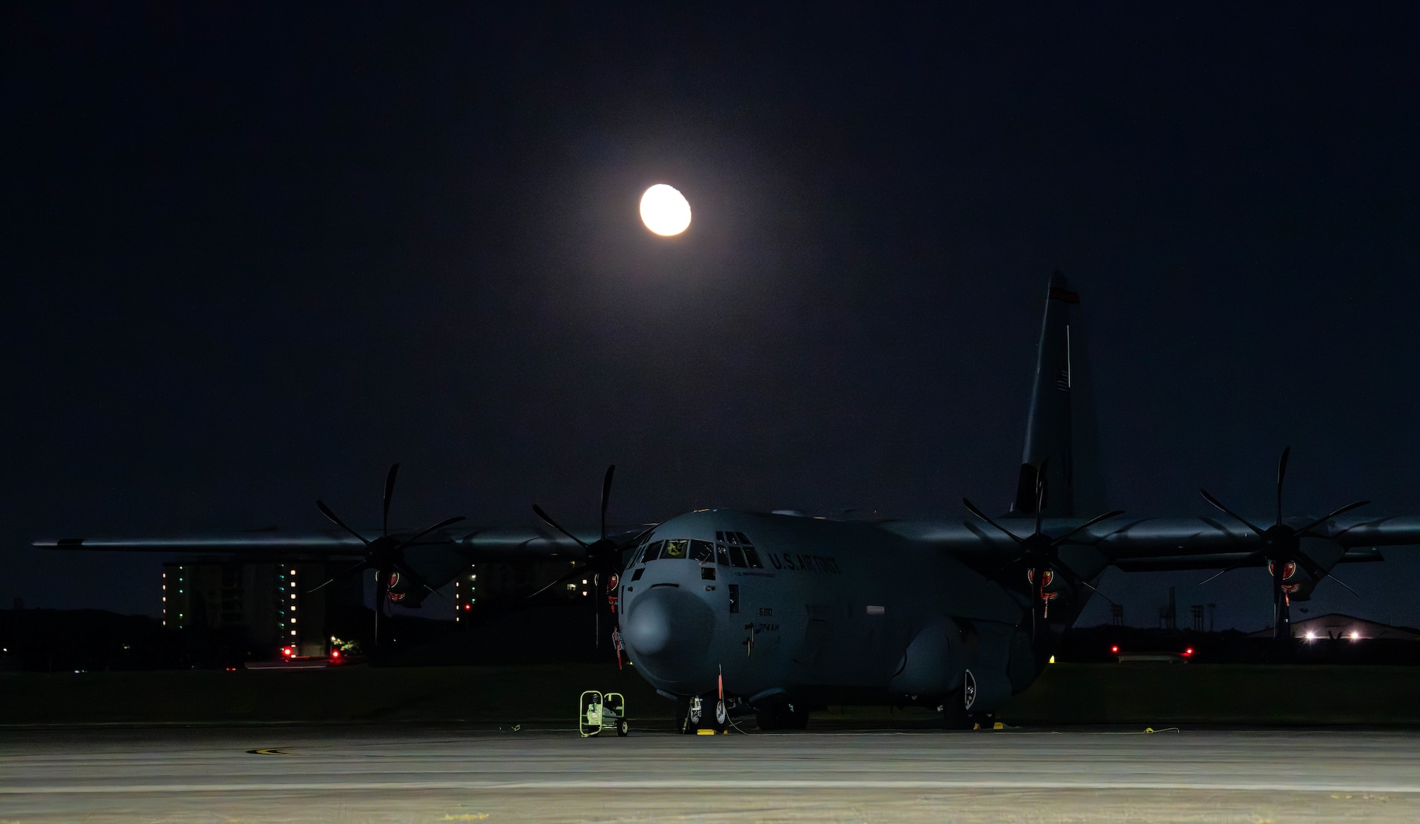 A U.S. Air Force C-130J Super Hercules assigned to the 36th Airlift Squadron is parked on the flightline.