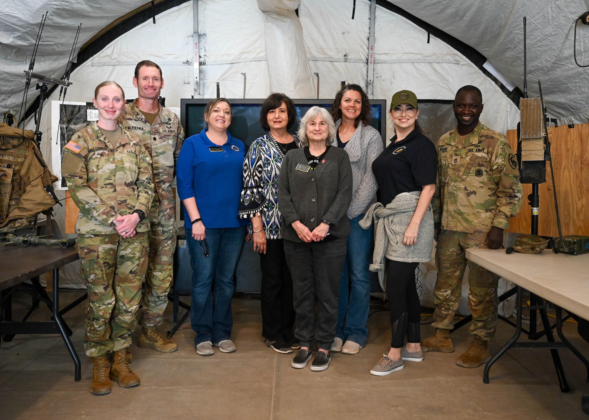 Members of the 344th Military Intelligence Battalion and 17th Training Wing Honorary Commanders pose for a photo at Goodfellow Air Force Base, Texas, Oct. 18, 2024. The honorary commanders saw how the 17th TRW partners with all branches hosted at Goodfellow to stay at the forefront of military capability. (U.S. Air Force photo by Senior Airman Zach Heimbuch)