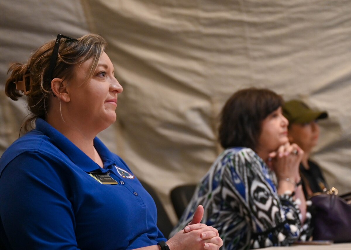 Michelle Ferguson, 17th Training Wing Honorary Commander, is briefed on the mission of Command Post Sentinel at Goodfellow Air Force Base, Texas, Oct. 18, 2024. Command Post Sentinel transformed from Forward Operating Base Sentinel as the Department of Defense shifts its focus to near-peer adversaries and Great Power Competition. (U.S. Air Force photo by Senior Airman Zach Heimbuch)