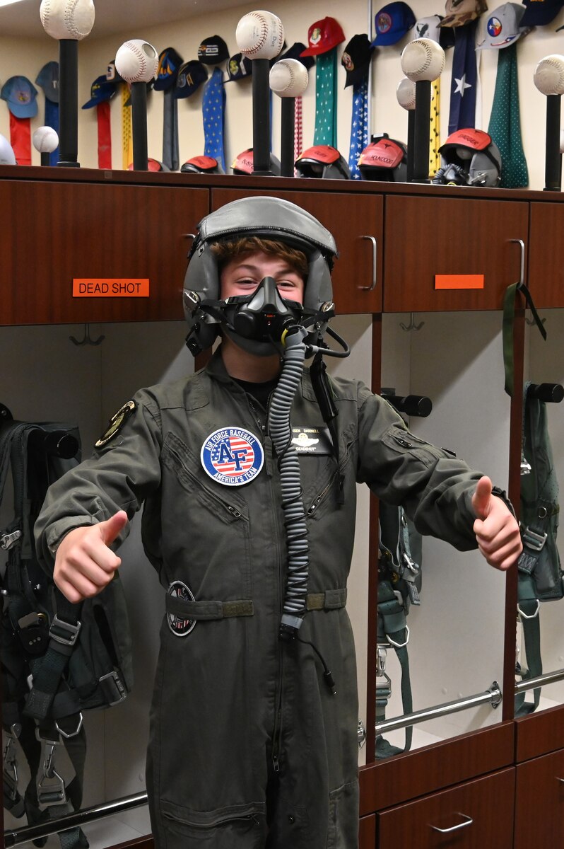 Carsen “Deadshot” Darnell, an 11-year-old local middle schooler who is currently battling spinal cancer, donned a flight suit and helmet before posing for a picture at Kingsley Field in Klamath Falls, Oregon.