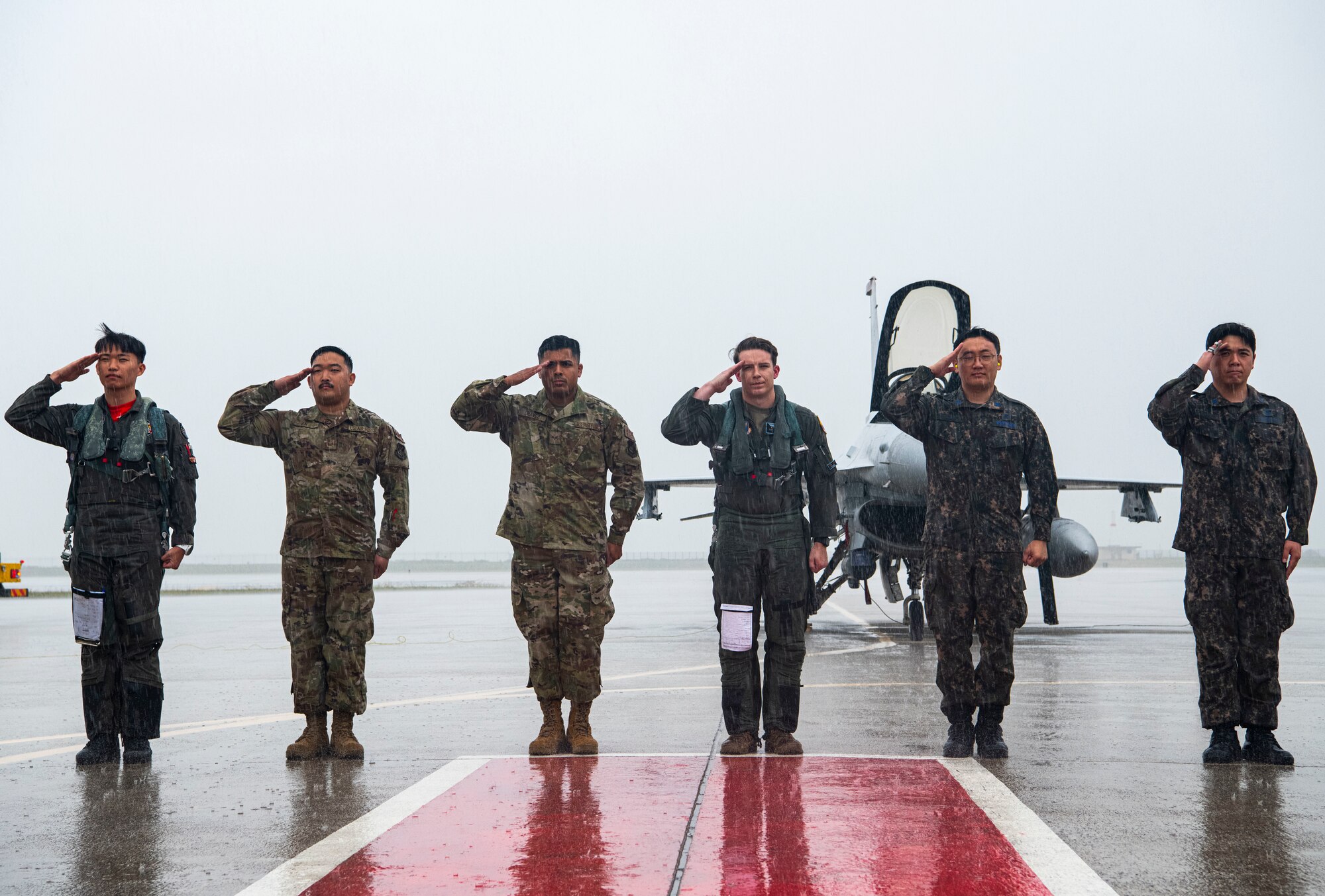 KUNSAN AIR BASE, Republic of Korea -- Republic of Korea Air Force and United States Air Force Airmen pose for a photo at the end of the ROK-US cross servicing demonstration.