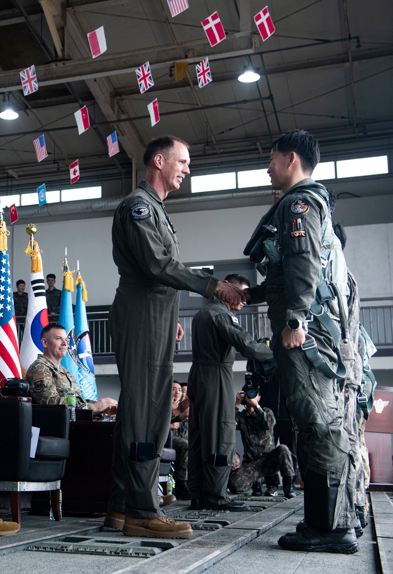 KUNSAN AIR BASE, Republic of Korea -- Republic of Korea Air Force and United States Air Force Airmen pose for a photo at the end of the ROK-US cross servicing demonstration.