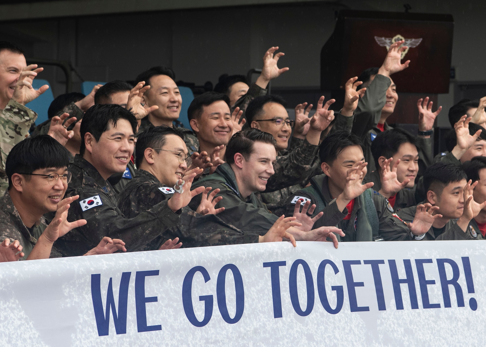 KUNSAN AIR BASE, Republic of Korea -- Republic of Korea Air Force and United States Air Force Airmen pose for a photo at the end of the ROK-US cross servicing demonstration.