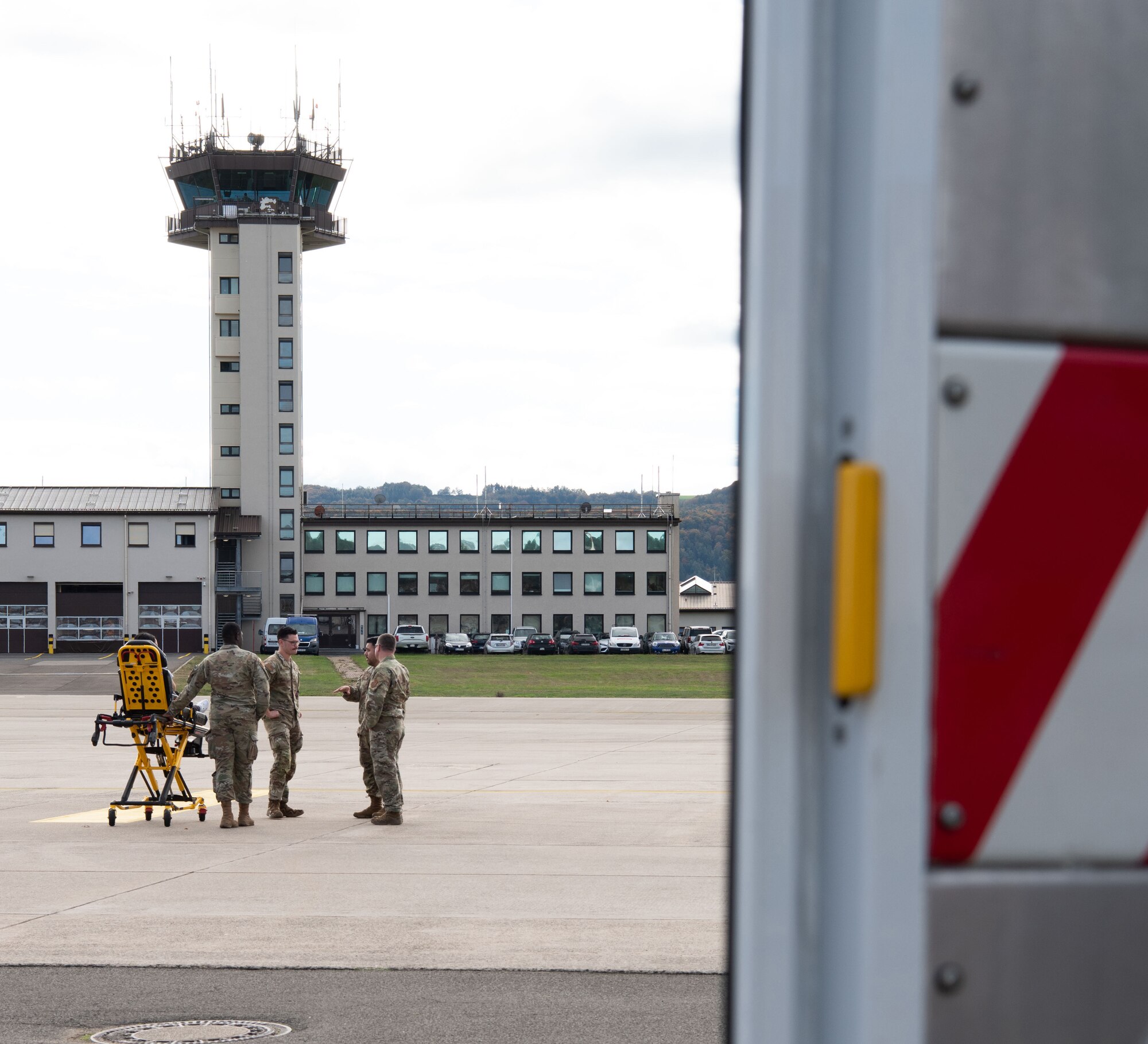 Members of the Landstuhl Regional Medical Center receive a simulated returnee from captivity during the U.S. European Command Phase II Reintegration exercise scenario
