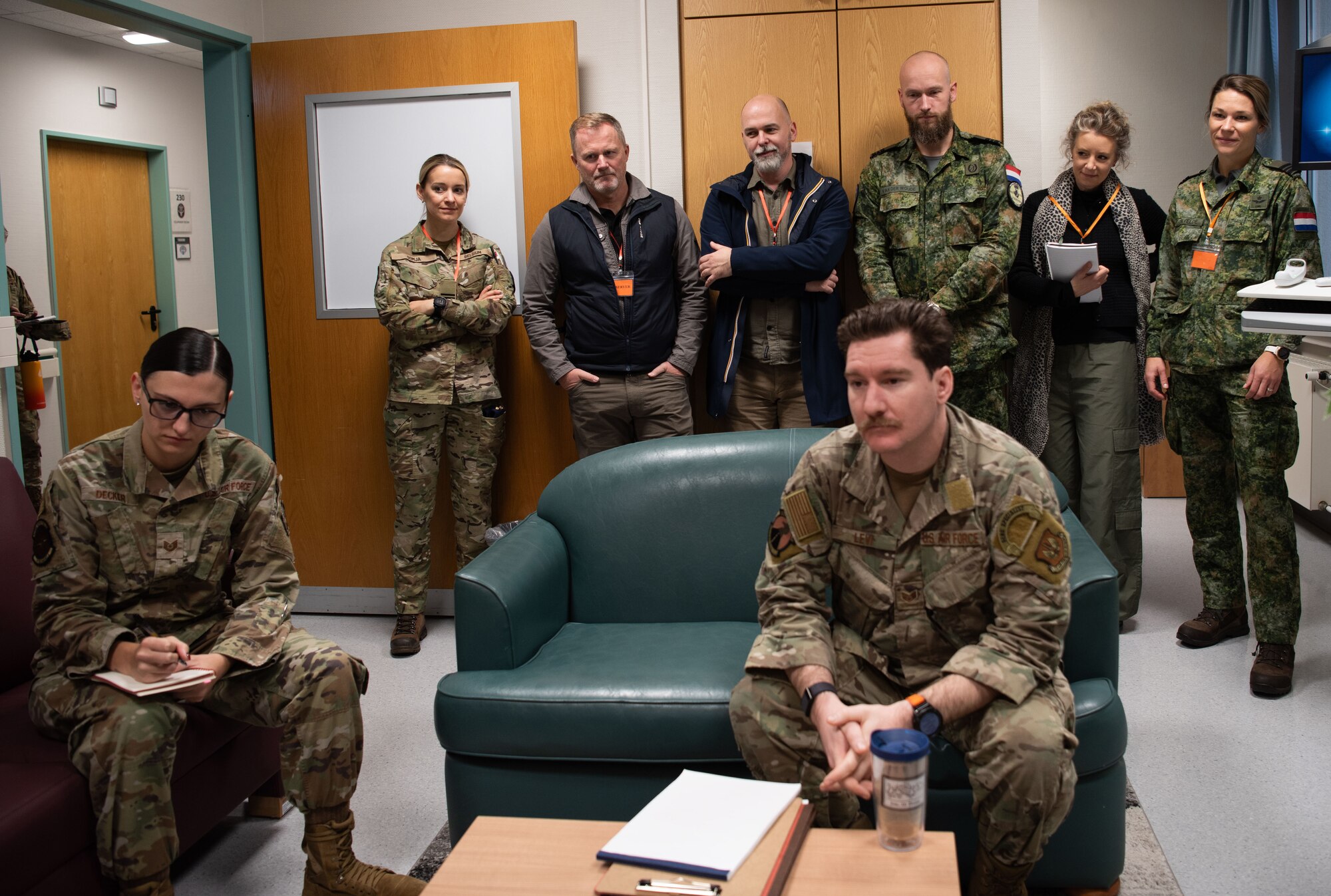 Service and military affiliated members from Norway, Belgium, the Netherlands and Sweden observe the Survival, Evasion, Resistance, and Escape and intelligence debriefs during the U.S. European Command Phase II Reintegration exercise