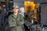 NAVAL STATION ROTA, Spain (Sep. 17, 2024) Construction Mechanic 2nd Class Gerould Scot from Livonia, N.Y., assigned to Naval Mobile Construction Battalion (NMCB) 27, temporarily assigned to NMCB 1, stands next to the 12k forklift he repaired onboard Naval Station Rota, Spain, Sep. 17, 2024. NMCB 1, assigned to the 22nd Naval Construction Regiment, is forward deployed across the U.S. Naval Forces Europe-Africa area of operations in support of U.S. Sixth Fleet maritime operations to defend U.S., allied, and partner interests. (U.S. Navy photo by Mass Communication Specialist 1st Class Sean Rinner)