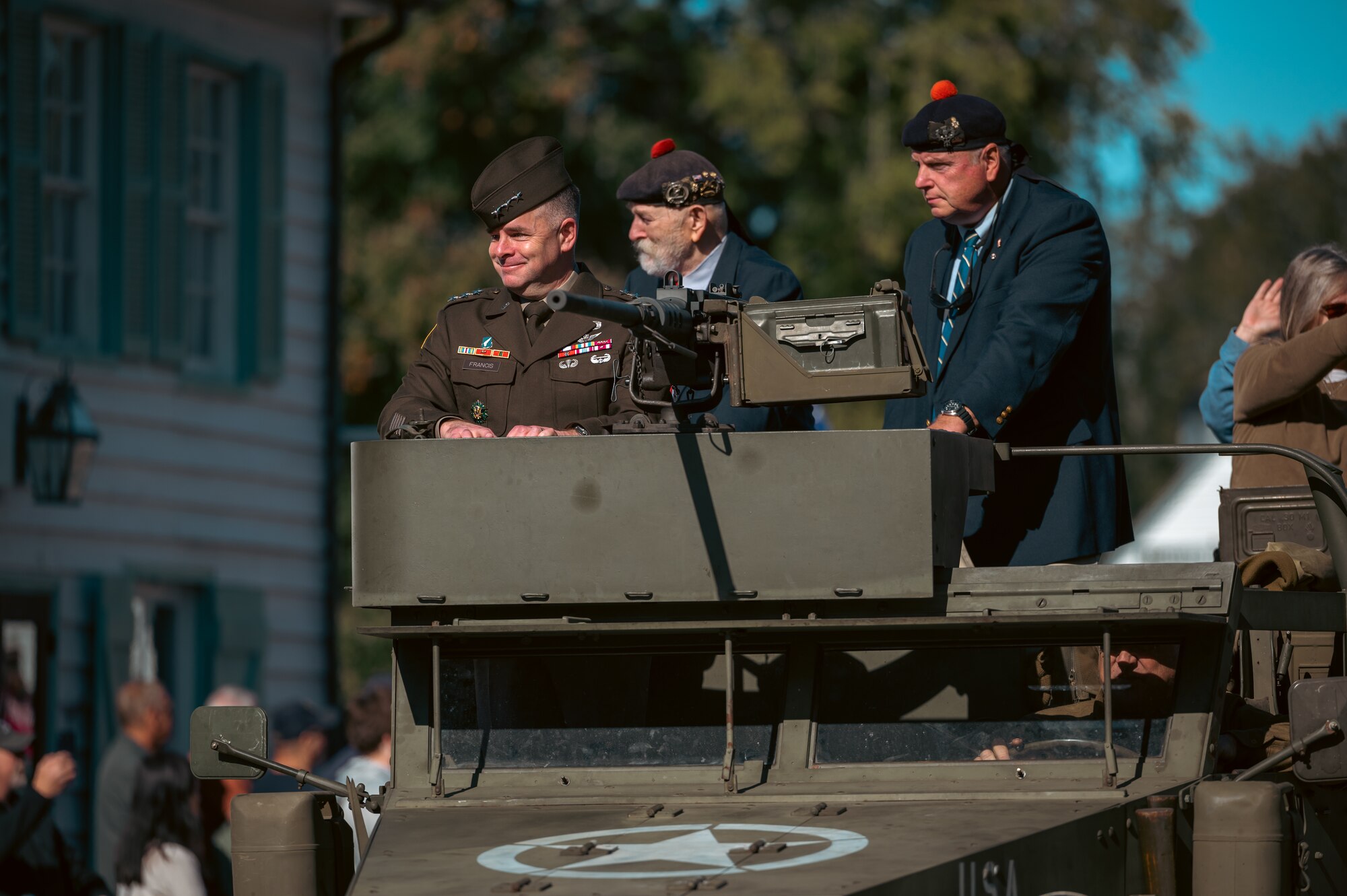 A general rides in a parade.