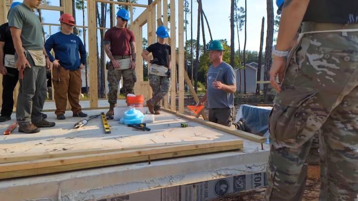 Cadre and students in the ARSOF Senior Leader Course at the Master Sgt. David K. Thuma Noncommissioned Officer Academy, the Special Operations Center of Excellence, participated in a community outreach program home building effort with Sandhills Habitat for Humanity on August 16, 2004, in Aberdeen, North Carolina.