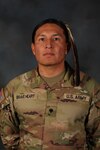 Native American Spc. Moses Brave Heart of the South Dakota Army National Guard’s 235th Military Police Company is growing his hair long after receiving an exception to military policy.