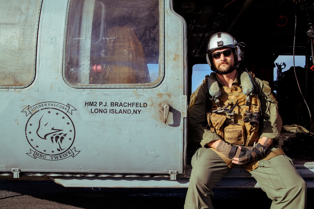 241018-N-CU716-1490 Hospital Corpsman 2nd Class Paul Zachary Brachfeld, from Long Island, New York, assigned to the Golden Falcons of Helicopter Sea Combat Squadron (HSC) 12, sits in an MH-60S Seahawk while underway in the Pacific Ocean, Oct. 18, 2024. As an integral part of U.S. Pacific Fleet, U.S. 3rd Fleet operates naval forces in the Indo-Pacific in addition to providing realistic and relevant training necessary to flawlessly execute our Navy’s timeless roles of sea control and power projection. U.S. 3rd Fleet works in close coordination with other numbered fleets to provide commanders with capable, ready forces to deploy forward and win in day-to-day competition, in crisis, and in conflict. (U.S. Navy photo by Mass Communication Specialist Seaman Geoffrey L. Ottinger)