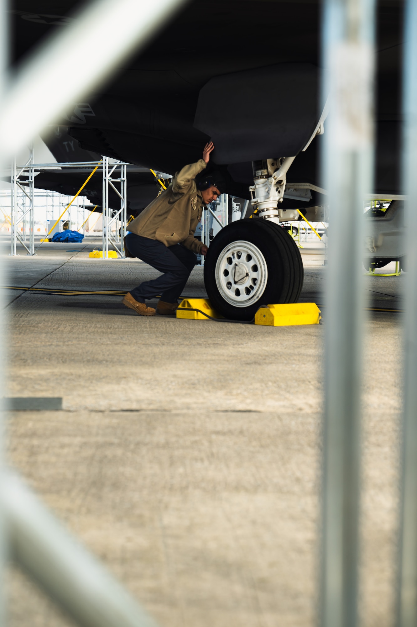 crew chief does final checks on f-35