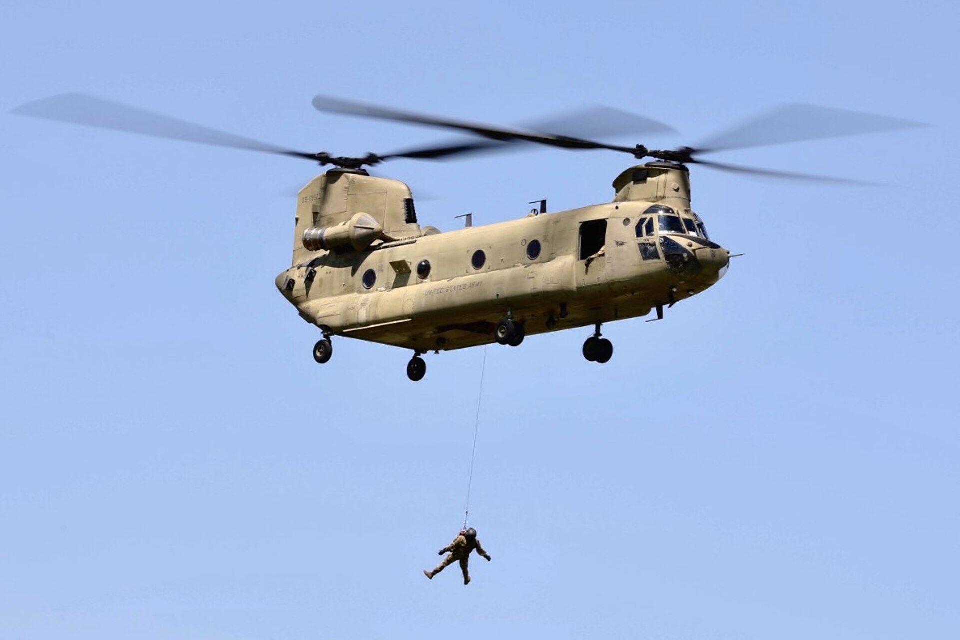 U.S. Soldiers with Bravo Company, 2-104th General Support Aviation Battalion, 28th Expeditionary Combat Aviation Brigade, train hoist operations in a CH-47 Chinook helicopter during annual training at Muir Army Heliport, Fort Indiantown Gap, Pennsylvania, June 28, 2024. (U.S. Army National Guard photo by 1st Lt. Kate Kramer)