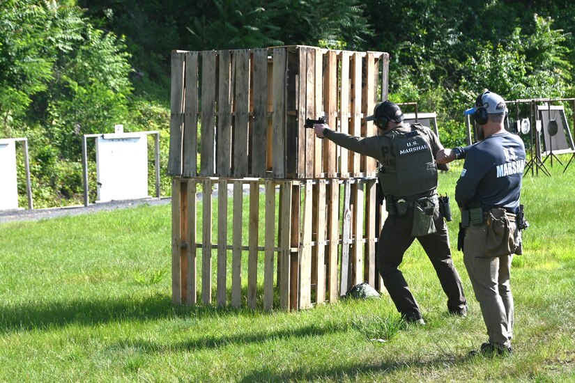 U.S. Marshals conduct training on a firing range at Fort Indiantown Gap, Pa., June 12, 2024. About 30 U.S. Marshals from around the country conducted training on high-stress scenarios at Fort Indiantown Gap June 3 to 13. (Pennsylvania National Guard photo by Brad Rhen)