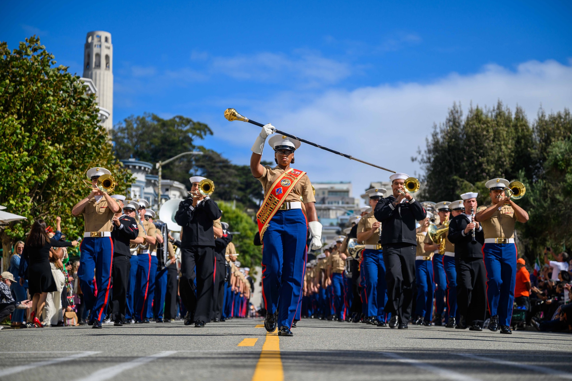 U.S. Marines, attached to the 1st Marine Division Band, and U.S. Navy, attached to Navy Band Southwest, march in the San Francisco Italian Heritage Parade during San Francisco Fleet Week 2024 October 13. SFFW, now in its 43rd iteration, is a time-honored sea service celebration that allows citizens of the Bay Area to witness today’s maritime capabilities firsthand. Nearly 2,500 Sailors, Marines, and Coast Guardsmen will showcase their capabilities and equipment, participate in various community service events, and enjoy the hospitality of the Bay Area during the event. (U.S. Navy photo by Mass Communication Specialist 1st Class Jesse Monford)