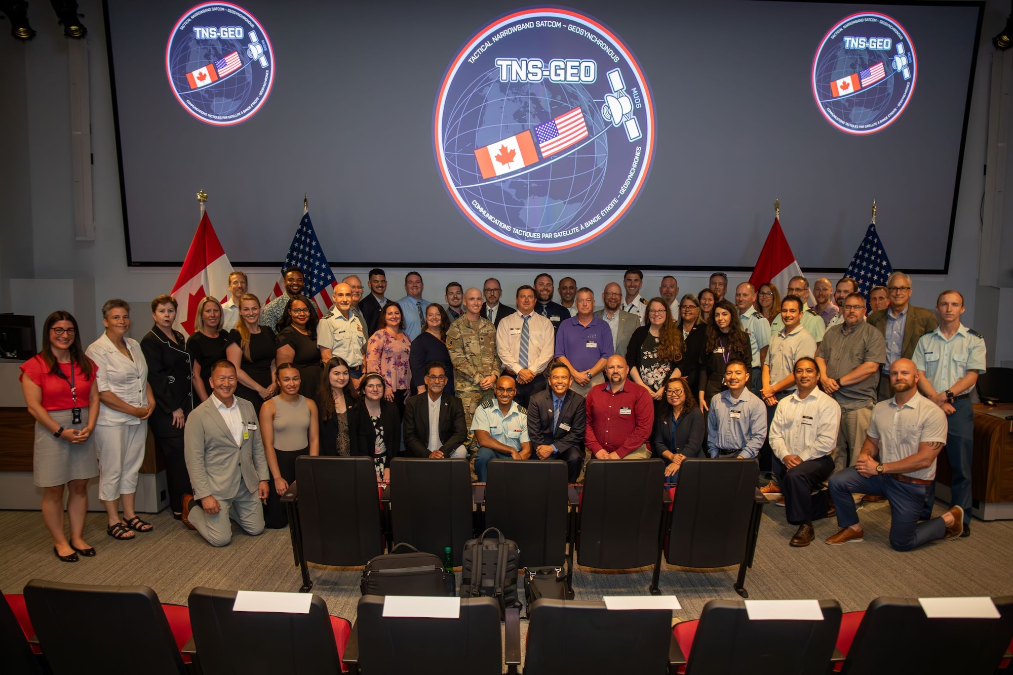 The combined U.S. and Canada team responsible for the FMS project providing MUOS access to Canada met in Ottawa from July 10 -11, 2024 to celebrate a successful Initial Operational Capability (IOC) event and kick off the Operations and Sustainment (O&S) phase.