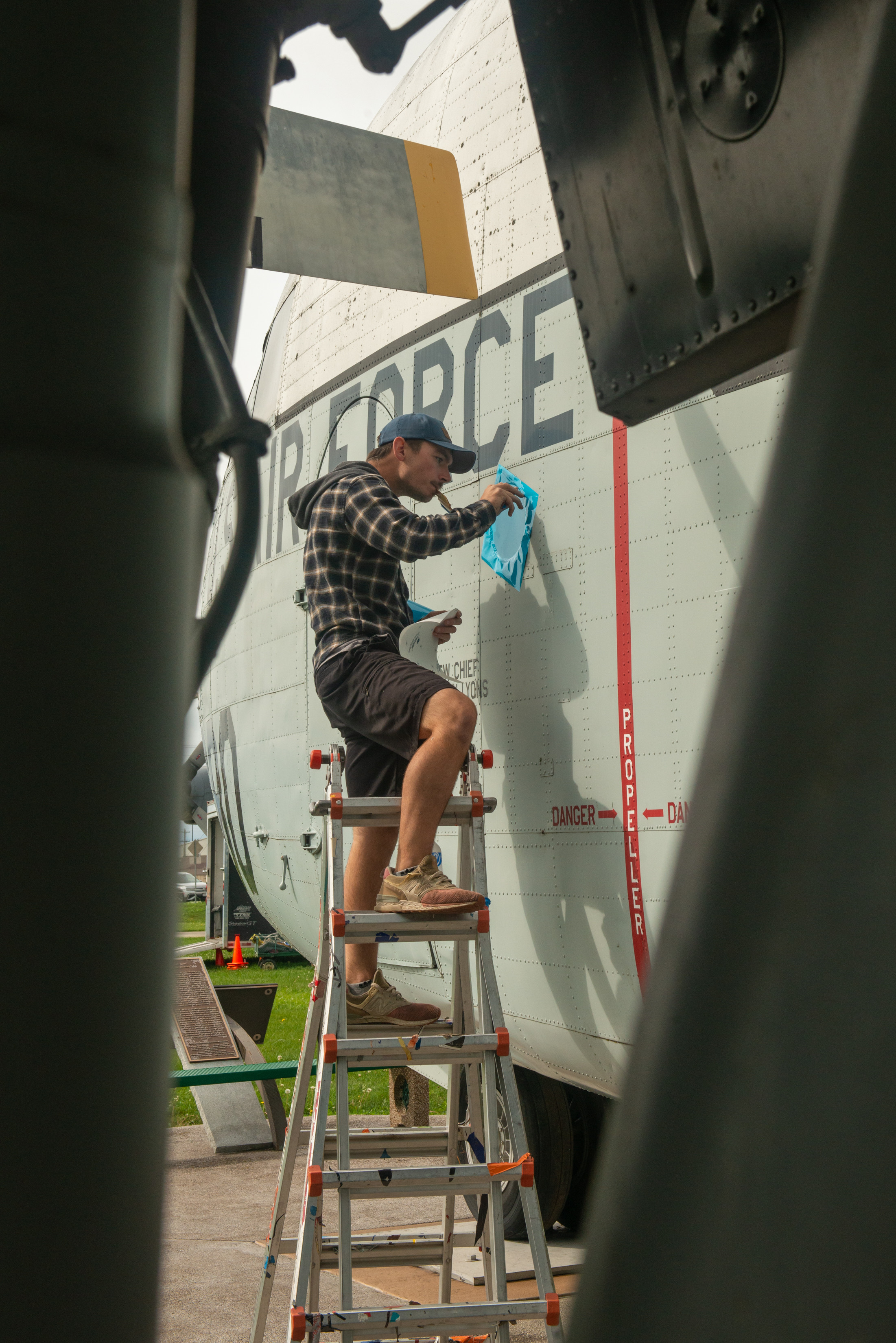 Streamline Design workers update static aircraft as part of preservation efforts