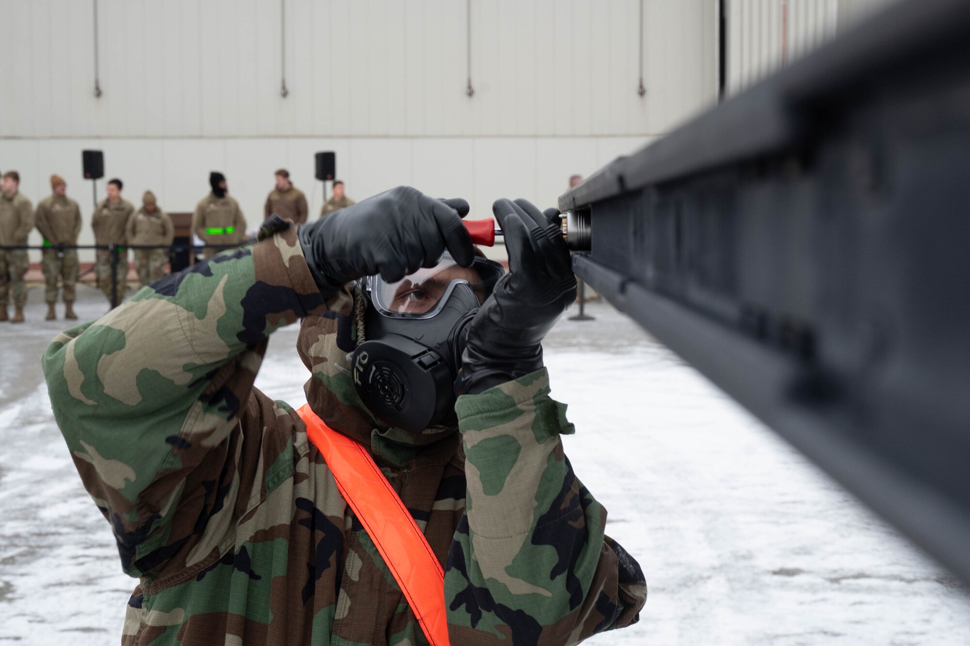 U.S. Air Force Senior Airman Daniel Boyd, 18th Fighter Generation Squadron munitions specialist, secures a hardpoint on an F-16 Fighting Falcon aircraft during the third quarter load competition at Eielson Air Force Base, Alaska, Oct. 18, 2024.