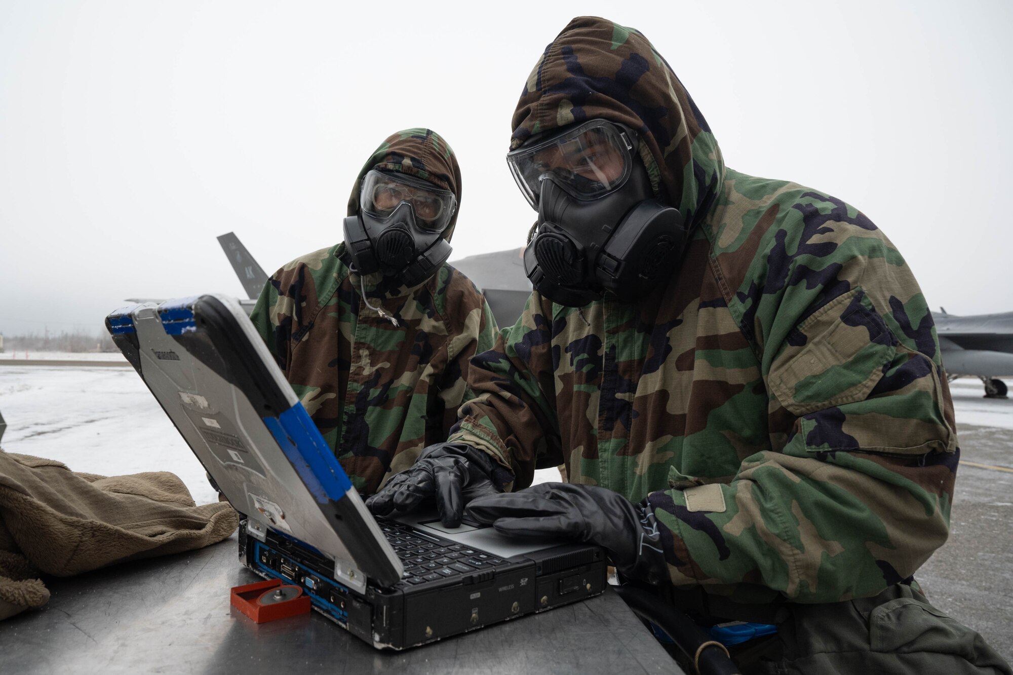 U.S. Airmen assigned to the 355th Fighter Generation Squadron, run a final diagnostic after loading munitions onto an F-35A Lightning II during the third quarter load competition at Eielson Air Force Base, Alaska, Oct. 18, 2024.