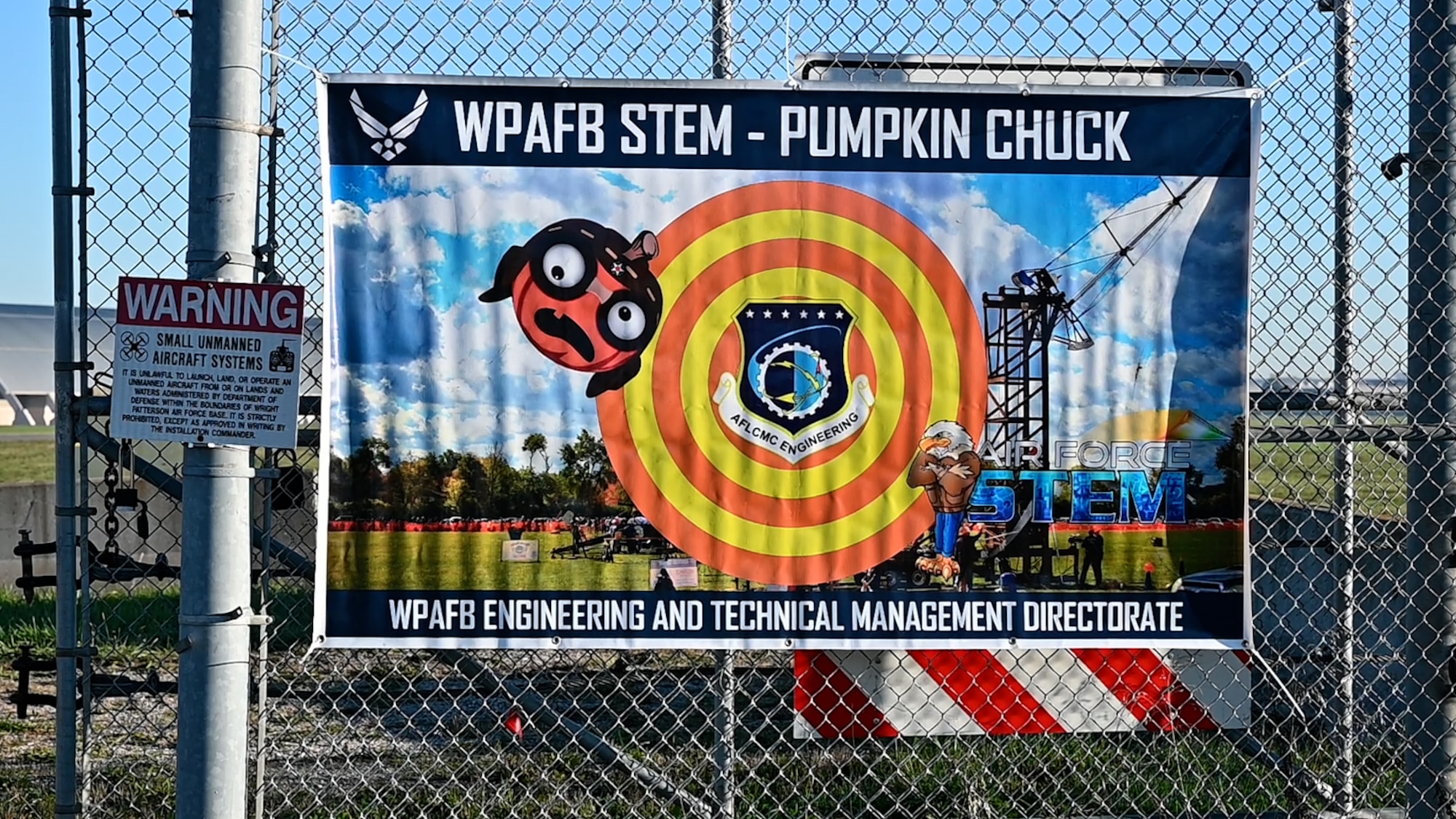 A photo of a sign promoting the Pumpkin Chuck event.