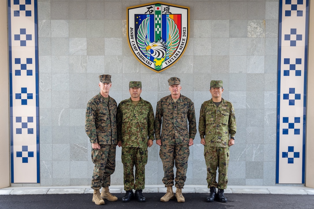 U.S. Marine Corps Lt. Gen. James Glynn, left, commanding general of Marine Forces Pacific, and Lt. Gen. Roger B. Turner, middle-right, commanding general of III Marine Expeditionary Force, pose for a photo with Japan Ground Self-Defense Force members during exercise Keen Sword 25 at JGSDF Camp Ishigaki, Okinawa, Japan, Oct. 23, 2024. KS25 is a biennial, joint and bilateral field-training exercise involving U.S. military and Japan Self-Defense Force personnel, designed to increase readiness and interoperability while strengthening the ironclad U.S.-Japan alliance. (U.S. Marine Corps photo by Staff Sgt. JVonnta Taylor)