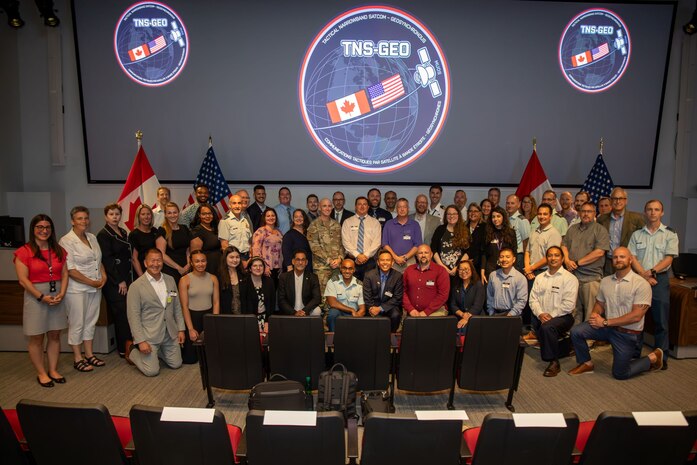 The combined U.S. and Canada team responsible for the FMS project providing MUOS access to Canada met in Ottawa from July 10 -11, 2024 to celebrate a successful Initial Operational Capability (IOC) event and kick off the Operations and Sustainment (O&S) phase.